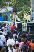 WEST INDIES, St Vincent & The Grenadines, Union Island, Guitarist and sound system at Easterval