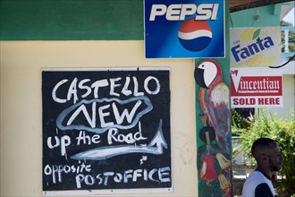 WEST INDIES, St Vincent & The Grenadines, Union Island, Signs on a Clifton shop