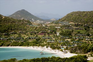 WEST INDIES, St Vincent & The Grenadines, Canouan, Jambu Beach at Raffles Resort with Union Island