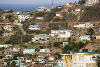 WEST INDIES, St Vincent & The Grenadines, Canouan, Local hillside housing in Charlestown