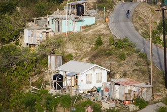 WEST INDIES, St Vincent & The Grenadines, Canouan, Local hillside housing in Charlestown