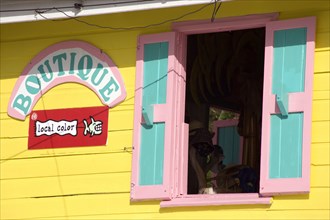 WEST INDIES, St Vincent & The Grenadines, Bequia, Colourful tourist shop in Port Elizabeth