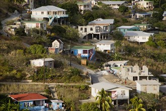 WEST INDIES, St Vincent & The Grenadines, Bequia, Hillside housing of the village of Hamilton