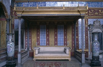 TURKEY, Istanbul, Topkapi Palace Imperial Hall sofa under canopy