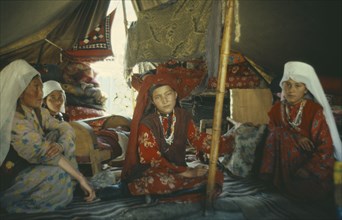 AFGHANISTAN, People, Nomadic Kirghiz women and girls inside traditional ger.