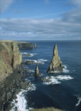 SCOTLAND, Highland, Duncansby Head, Stacks of Duncansby.  Pointed sea stacks off the North East
