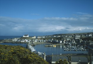 SCOTLAND, Moray, Findochty, Fishing village on north coast with pleasure boats moored within
