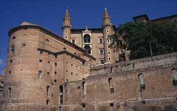 ITALY, Marche, Urbino, "Palazzo Ducale, Renaissance palace above the town. Looking up at towers.."