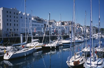 UNITED KINGDOM, Channel Islands, Guernsey, St Peter Port. Victoria Marina yachts and quayside