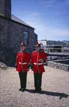 UNITED KINGDOM, Channel Islands, Guernsey, St Peter Port. Castle Cornet. Noon Day Guards standing