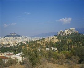 GREECE, Central, Athens, Acropolis and Lykavitos in the distance.View of the countryside with the