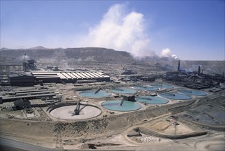 CHILE, Antofagasta, Chuquicamata, "Copper Mine, smoke coming out of a stack in the distance.