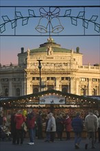 AUSTRIA, Lower Austria, Vienna, The Rathaus Christmas Market with The Burgtheater in the background
