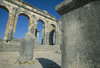 MOROCCO, Volubilis, The Basilica.  Cropped view of stone block inscribed with Roman script with