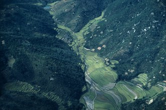 SOUTH KOREA, Farming, Rice, Aerial view over rice paddies across valley south of Pusan.