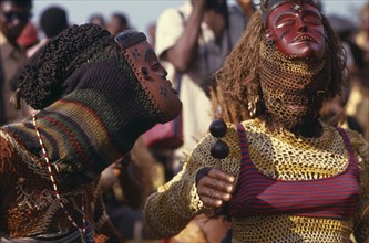 CONGO, Gungu, Masked dancers at Bapende tribe Gungu Festival.