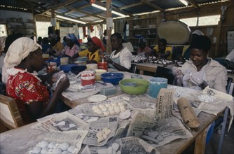 KENYA, Nairobi, Female workforce in factory producing bead jewellery for export.