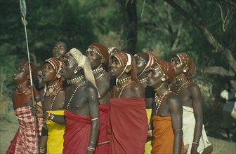 KENYA, South Horr, Samburu moran warriors singing.