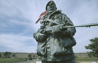 ENGLAND, Hampshire, Portsmouth, Royal Marines Museum. Large statue of a Royal Marine holding a gun