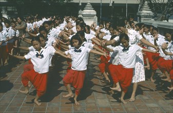THAILAND, Bangkok, Lines of young pupils under instruction at School of Dance.