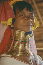 THAILAND, Chiang Rai, "Portrait of Paduang, long neck, woman, metal rings."