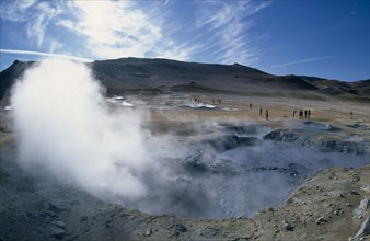 ICELAND, Namafjall, Hverir. High temperature geothermal area. Steam rising from the hot springs