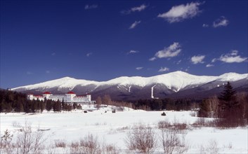 USA, New Hampshire, Bretton Woods, "Mount Washington Hotel, large white building with red roof,