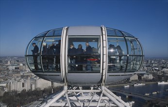 ENGLAND, London, British Airways London Eye capsule and the London skyline.