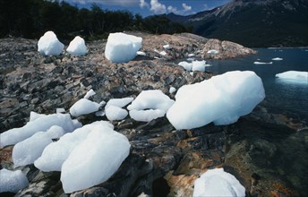ARGENTINA, Moreno Glacier, Large blocks of ice on the rocky shore.