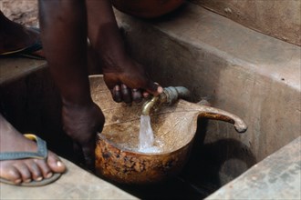 KENYA, Rainwater, Domestic water supply from small rain fed roof tank.