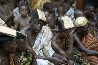 GHANA, Tribal People, Ashanti elders wearing traditional headdresses decorated with gold at tribal