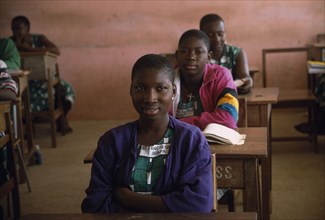 GHANA, North, Jirapa, "Students at St Francis girls secondary school, seated at desks in classroom