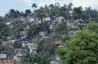 JAMAICA, Montego Bay, Norwood, "Overcrowded slum area, shanty housing on hillside with corrugated