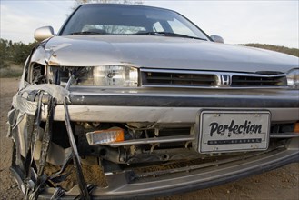 USA, New Mexico, Santa Fe, Damaged front of a crashed car