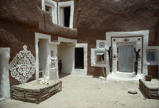 MAURITANIA, Oualata, "Traditional mud architecture decorated with bas relief motifs of applied