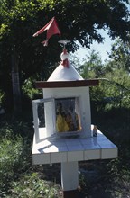 MAURITIUS, Religion, Hindu, Decorated figures in Hindu shrine.