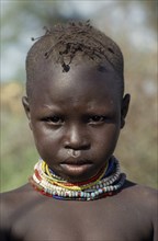 KENYA, Lokichokio, Head and shoulders portrait of Turkana boy