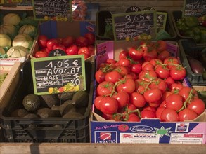 FRANCE, Deux Sevres Region, Poitiers, Tomatoes and Avocados on sale at the market in the town of