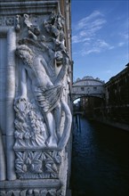 ITALY, Veneto, Venice, The Doges Palace. Relief carving of The Drunkenness of Noah or The Vine