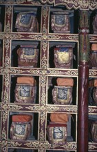 INDIA, Ladakh, Hemis Gompa, Detail of library of texts and scriptures in Buddhist monastery.
