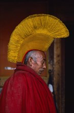 CHINA, Qinghai Province, Quezhang Lamasery, Portrait of Tibetan Yellow Hat Buddhist monk.