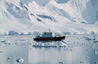 ANTARCTICA, Transport, British Ice Patrol ship HMS Endurance on water with snow covered mountains