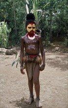PACIFIC ISLANDS, Melanesia, Papua New Guinea, Southern Highlands. Tari. Huli Tribe. Child dressed