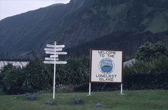 TRISTAN DA CUNHA, Communication, Sign with Welcome to the Loneliest Island written on it next to a