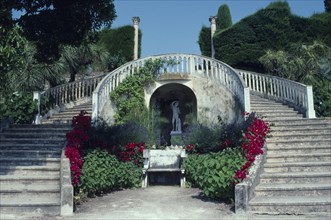FRANCE, Provence Cote d Azur, Antibes, Musee Ile de France garden with steps surrounding a bench