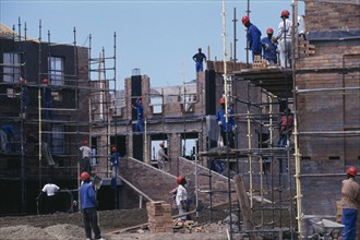 SOUTH AFRICA, Western Cape, Cape Town, Kenilworth.  Construction of medium income housing.