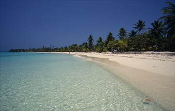 HONDURAS, Bay Islands, Roatan, "West Bay.  Stretch of quiet sandy beach fringed with palm trees