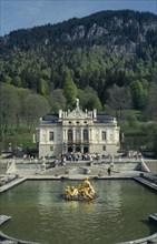 GERMANY, Bayern, Schloss Linderhof, Palace exterior with tourists crowds gathered at entrance.