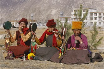 CHINA, Tibet, Lhasa, "Monk musicians, two of which are playing horns made from human thigh bones,
