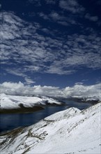 CHINA, Tibet, Yamdrok Tso, "The Turquoise Lake, with snow covered hills, seen from the summit of
